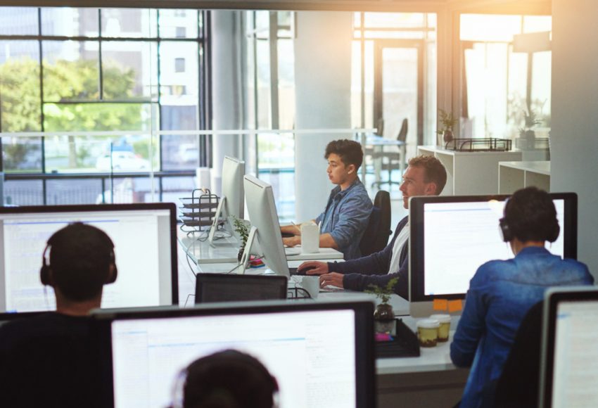 Cropped shot of programmers working in their office