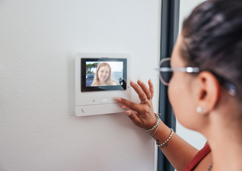 Video intercom displays a friend at the door.